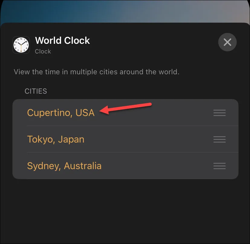 كيفية تغيير المدينة في القطعة على مدار الساعة على شاشة قفل iPhone 12