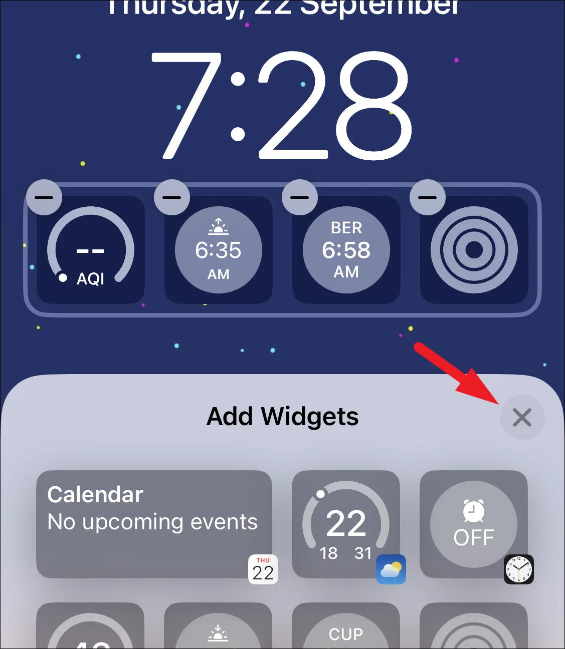 كيفية تغيير المدينة في القطعة على مدار الساعة على شاشة قفل iPhone 13