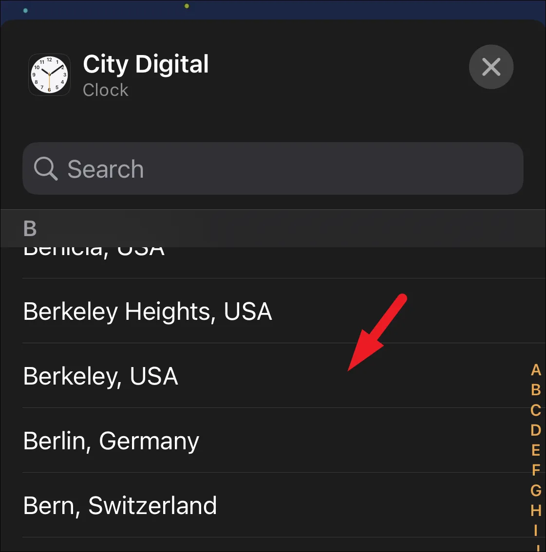 كيفية تغيير المدينة في القطعة على مدار الساعة على شاشة قفل iPhone 10